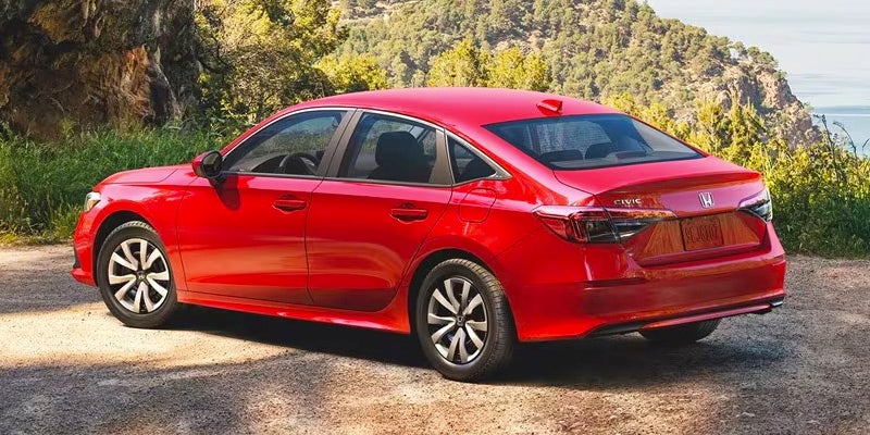 A red 2024 Honda Civic Sedan.