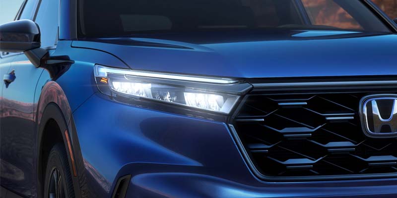 A blue 2024 Honda CR-V Hybrid.