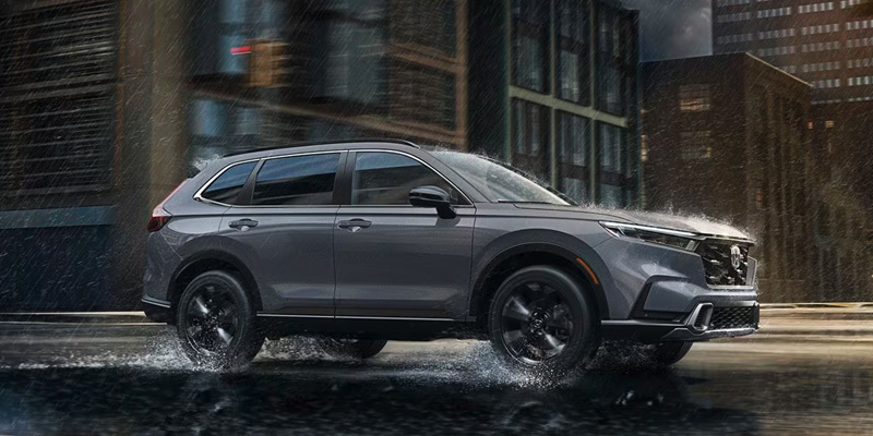 A 2024 Honda CR-V driving through rain.